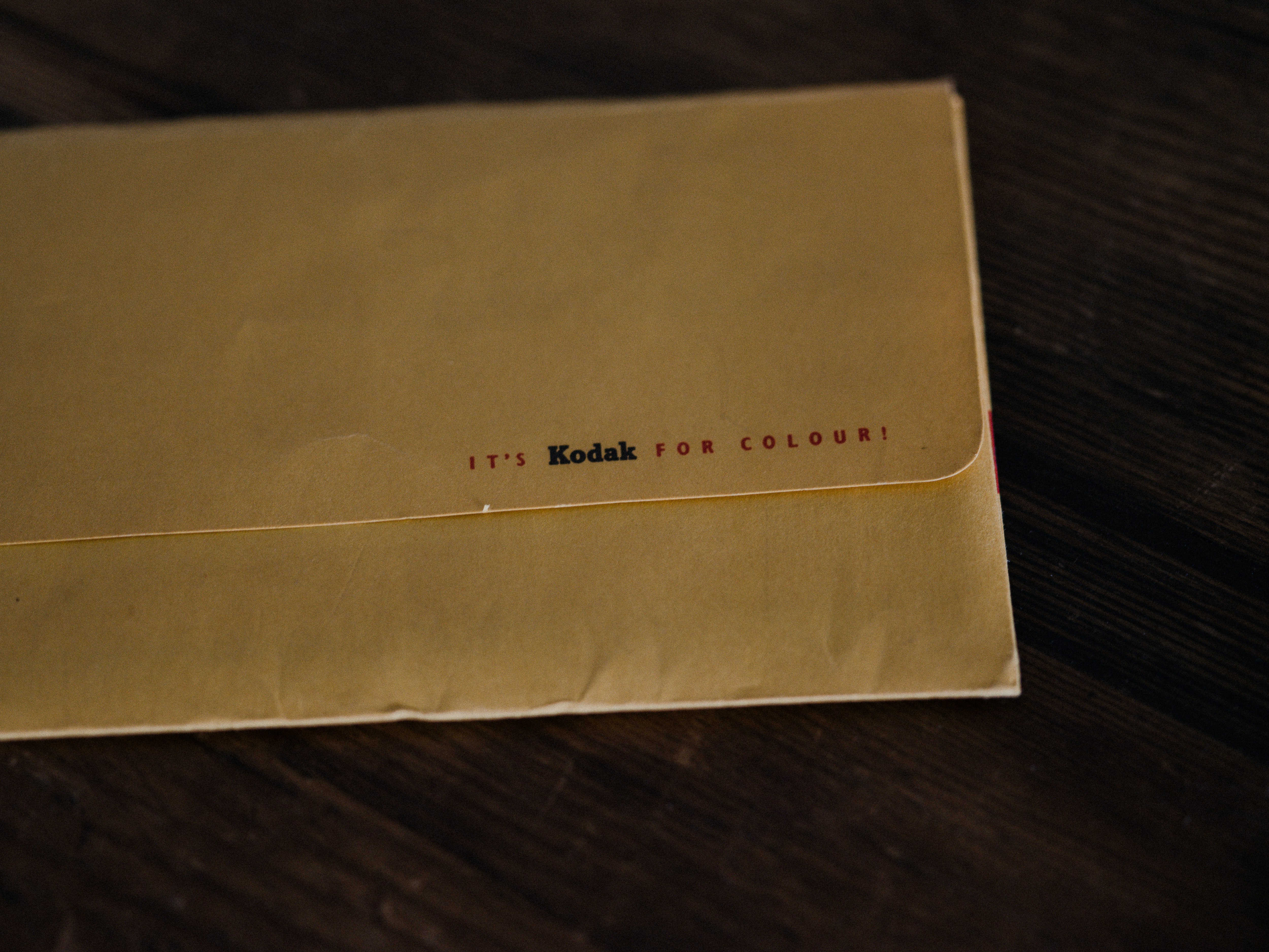 white envelope on brown wooden table